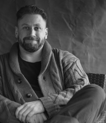 Man in chunky knit cardy